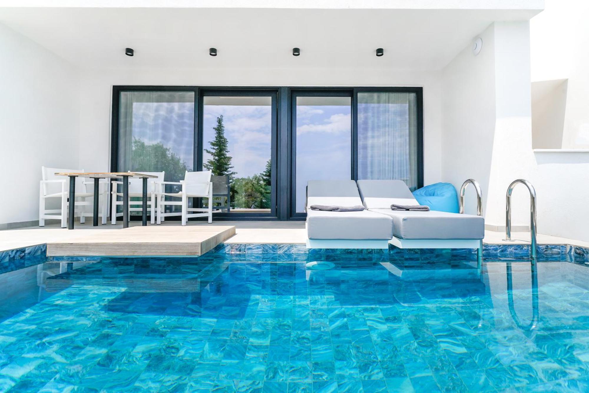 Mythodea Prive Luxury Suites Chrysi Ammoudia Extérieur photo